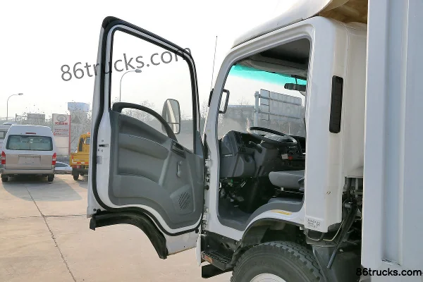 Qingling Isuzu 700P series medium truck composite version 189 hp 4X2(6 wheels) 7m van cargo truck Cab (1) | 86Trucks
