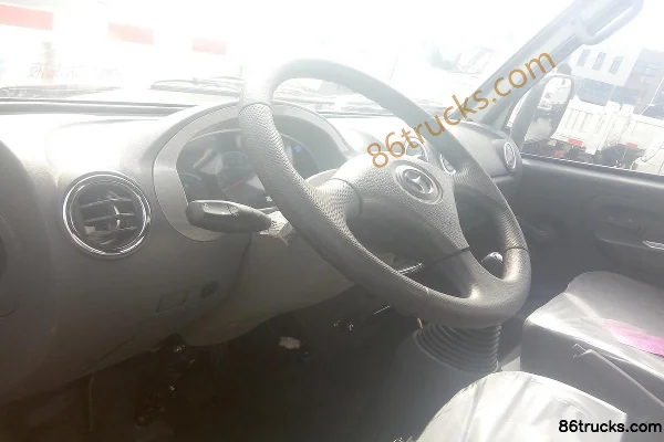 Shifeng Fengling 1.3L 87hp 4X2(6 wheels) gasoline 3.055m semi-row stake truck mini truck Cab (1) | 86Trucks