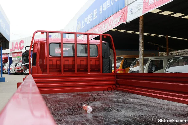 Yuejin Chaoyue C500-33 140 hp 4X2(6 wheels) 4.06 m single-row flatbed light truck (air brake) Body (3) | 86Trucks