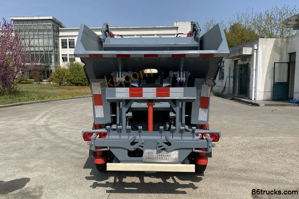 Yuejin Fuyun S70 113 hp 4X2(6 wheels) Saiwo brand self-loading garbage truck Exterior (2) | 86Trucks