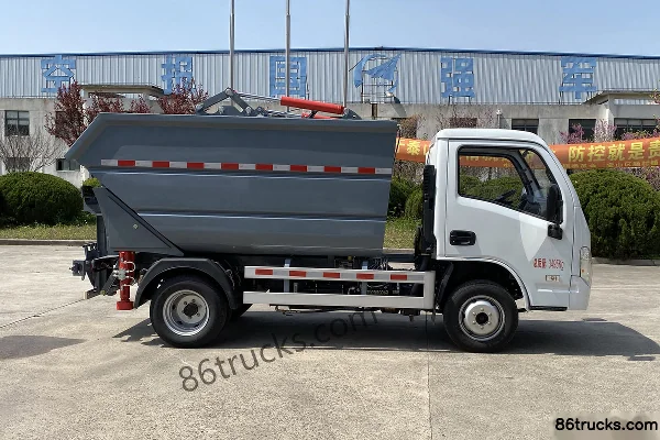 Yuejin Fuyun S70 113 hp 4X2(6 wheels) Saiwo brand self-loading garbage truck Exterior (3) | 86Trucks