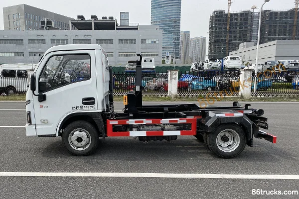 Yuejin Fuyun S80 95 ch 4X2(6 roues) benne à ordures à déchargement par conteneur (marque Saiwo) Extérieur (2) | 86Trucks