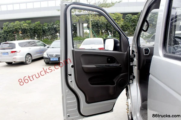 Dongfeng Xiaobawang W18 1.6L 122 hp 4X2(6 wheels) 2.55m double-row flatbed mini truck Cab (1) | 86Trucks