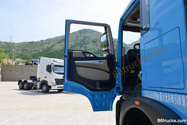 Sinotruk HOWO TX Heavy Truck 25T 6X4(10 wheels) Battery Swap Electric Tractor Truck 350.07kWh Cab (1) | 86Trucks