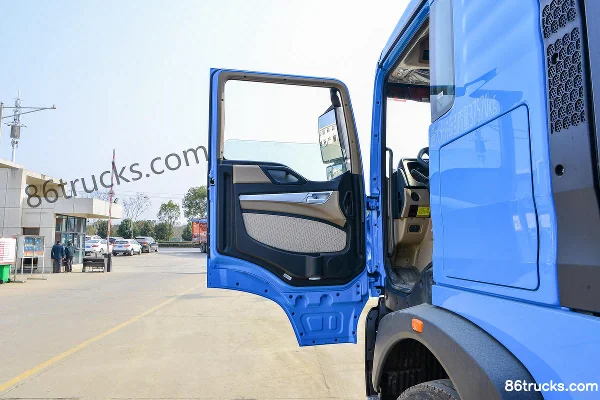 Sinotruk HOWO TX Heavy Truck 25T 6X4(10 wheels) battery-swap electric tractor truck 350kWh Cab (1) | 86Trucks