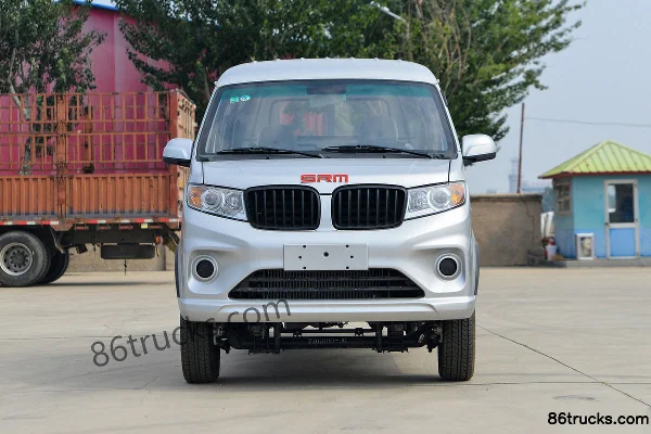 SRM Xinyuan Jinka S1 2024 Comfort 1.6L 112hp 4X2(6 wheels) CNG 2.55m Double Row Flatbed Mini Truck Exterior (2) | 86Trucks