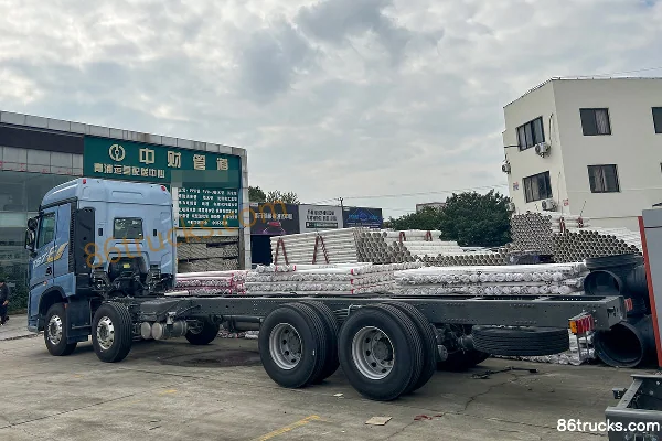 Sinotruk HOWO HOWO TS7 Wozun Edition 11.1L Diesel 460 hp 8X4(12 wheels) Sinotruk 12-Speed 9.6m Stake Cargo Truck Exterior (3) | 86Trucks